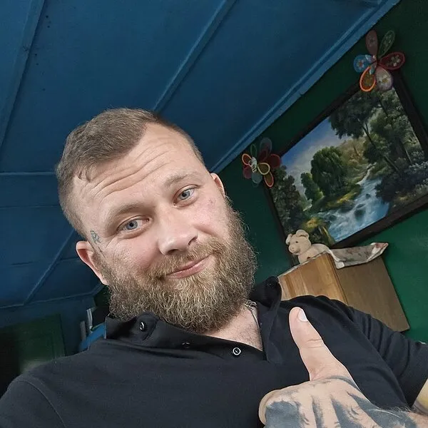 Николай